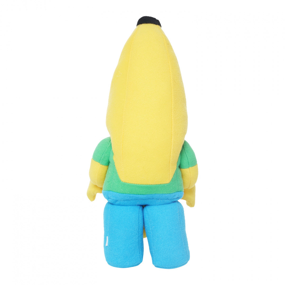 Pluszak LEGO banan w kolorowej zielonej bluzce i niebieskich spodniach widok z tyłu