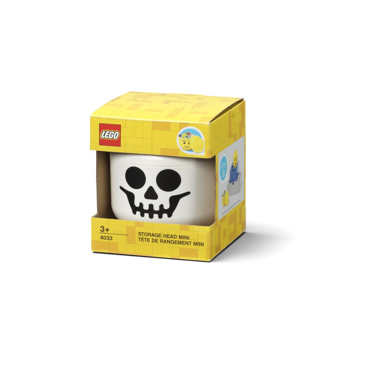 Pojemnik LEGO głowa szkieletor biały z czarnym motywem czaszki w żółtym opakowaniu LEGO
