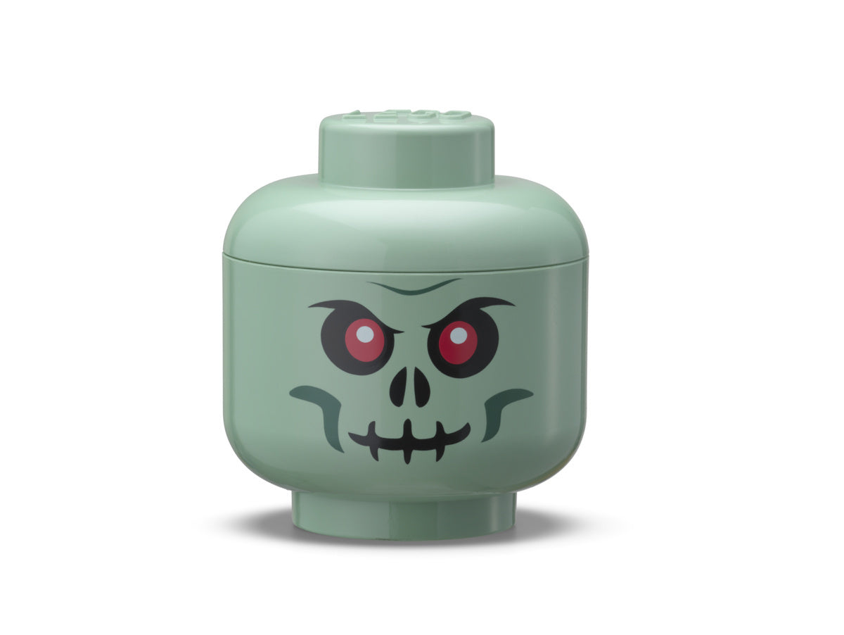 Pojemnik LEGO głowa zombie w kolorze zielonym z nadrukiem czaszki do przechowywania klocków