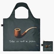 Torba podręczna Rene Magritte z nadrukiem fajki i napisem This is not a pipe w ciemnym kolorze