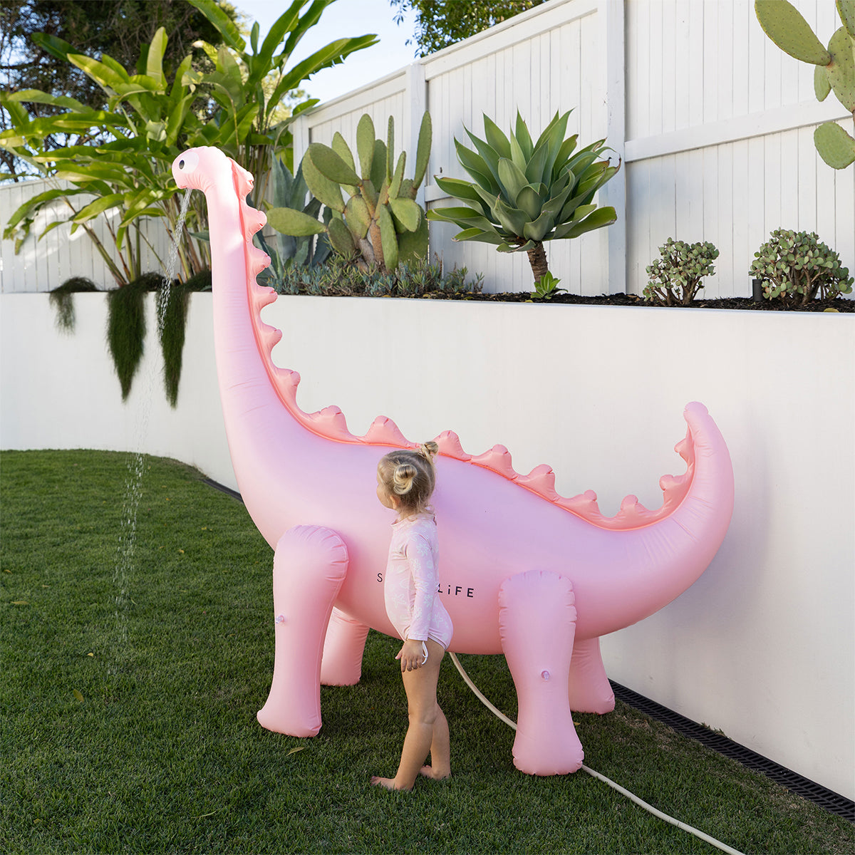 Rociador inflable gigante – Dino Into the Wild, rosa