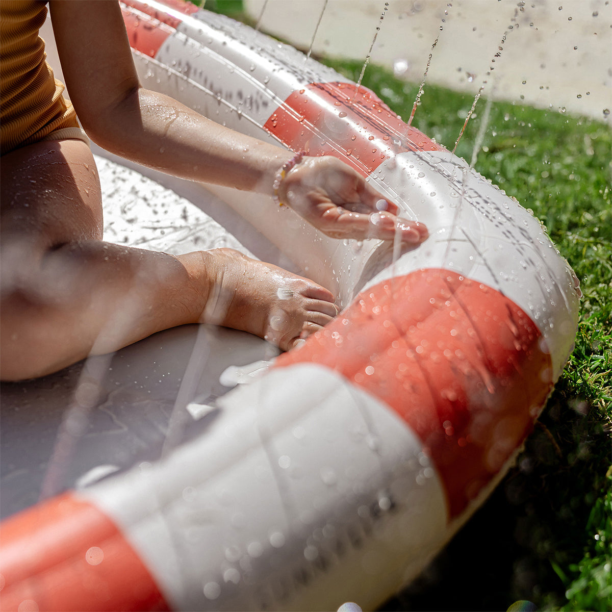 Sprinkler mat for kids – Poppy the Peach