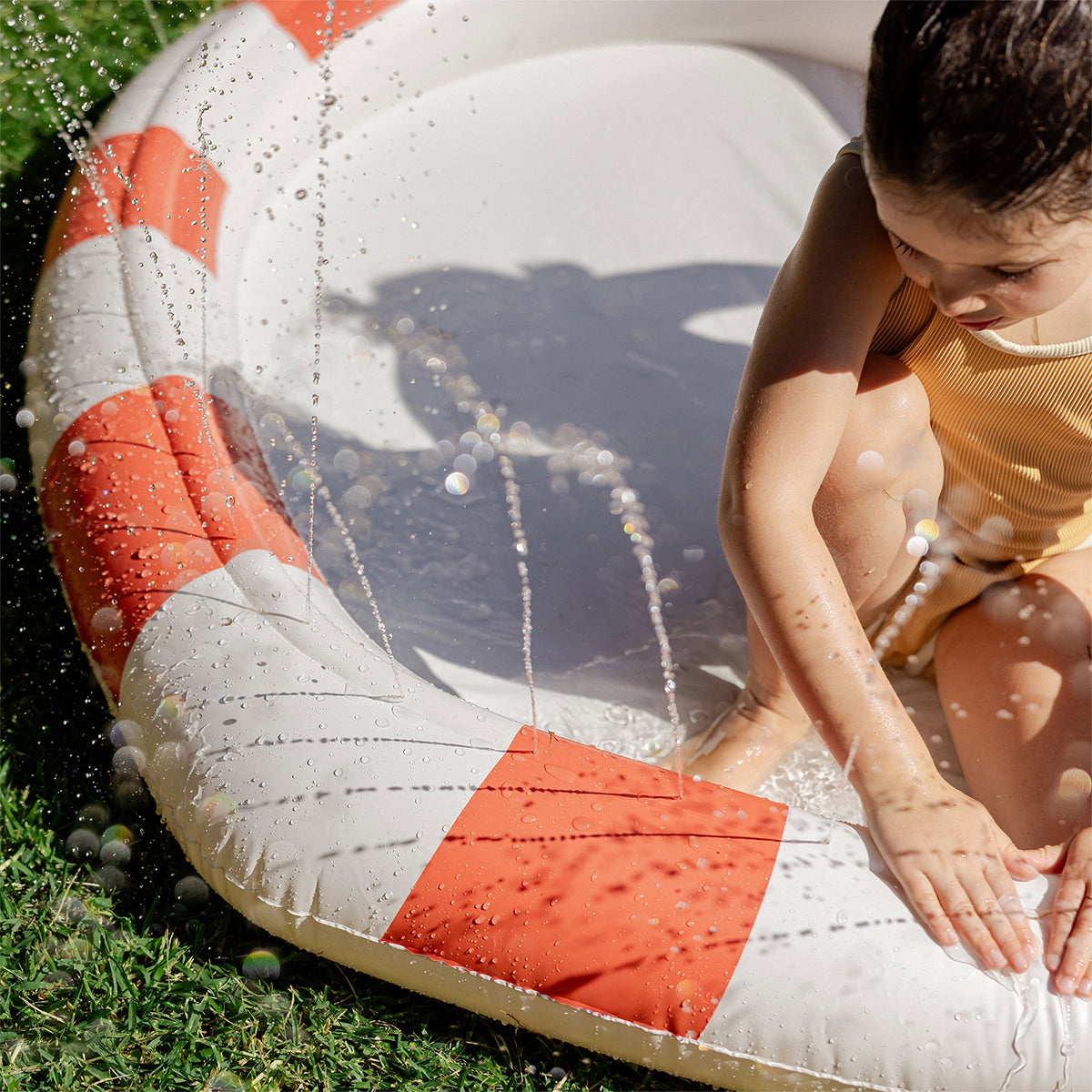 Sprinkler mat for kids – Poppy the Peach