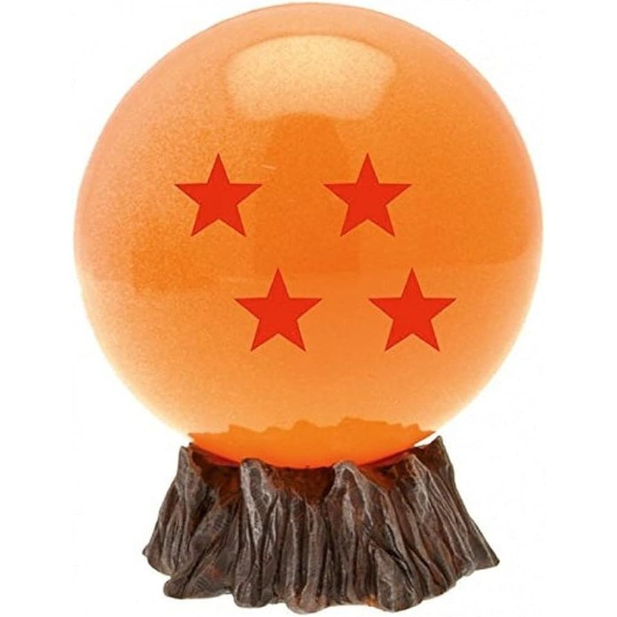 Pomarańczowa skarbonka Dragon Ball w kształcie czwartej smoczej kuli na podstawie z drewna