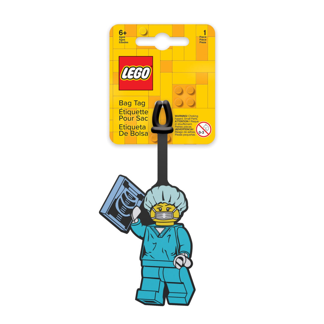 Zawieszka LEGO chirurg w niebieskim stroju medycznym z maską i rentgenem na bagaż