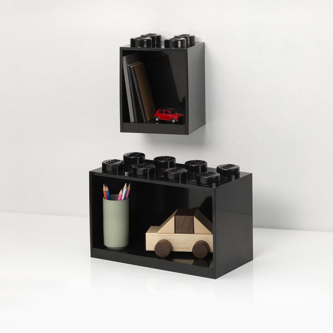 Czarne półki LEGO od BV JACOB COMPANY w formie klocków do nowoczesnej dekoracji ściennej
