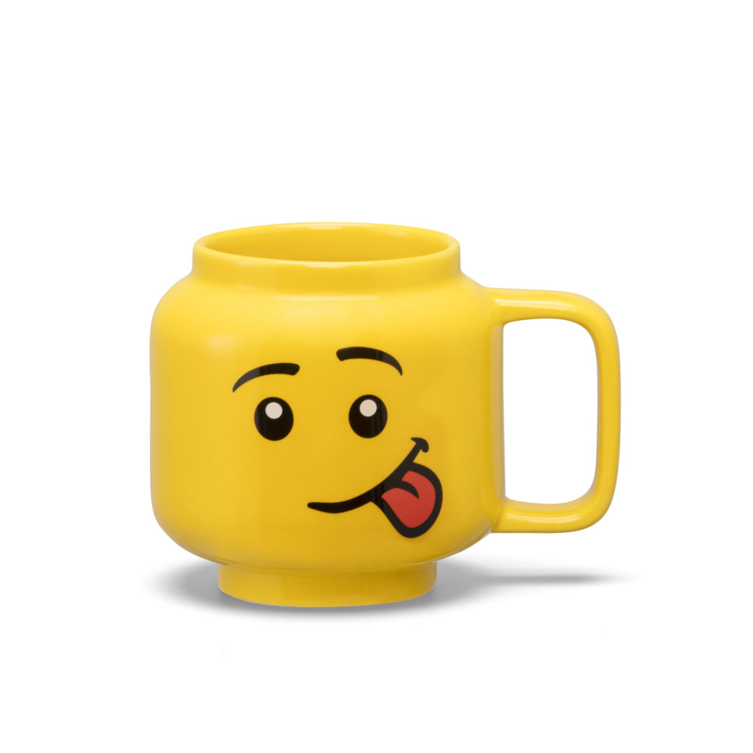 Żółty kubek LEGO głowa ceramiczny z zabawną twarzą i wystającym językiem