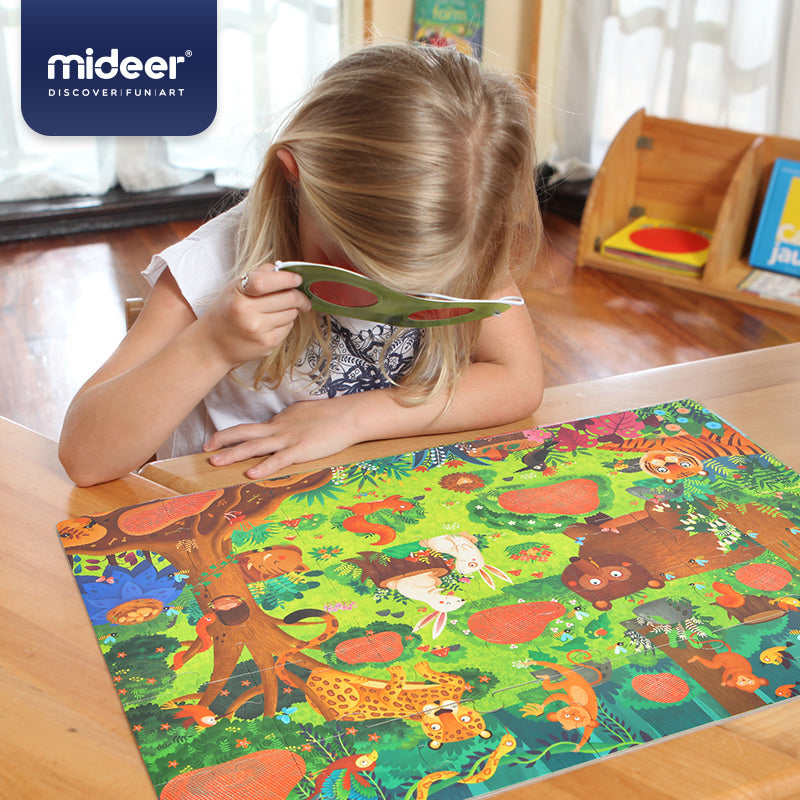 Dziecko bawiące się sekretne puzzle 3D dla dzieci odkrywające zwierzęta w lesie z użyciem czerwonych okularów