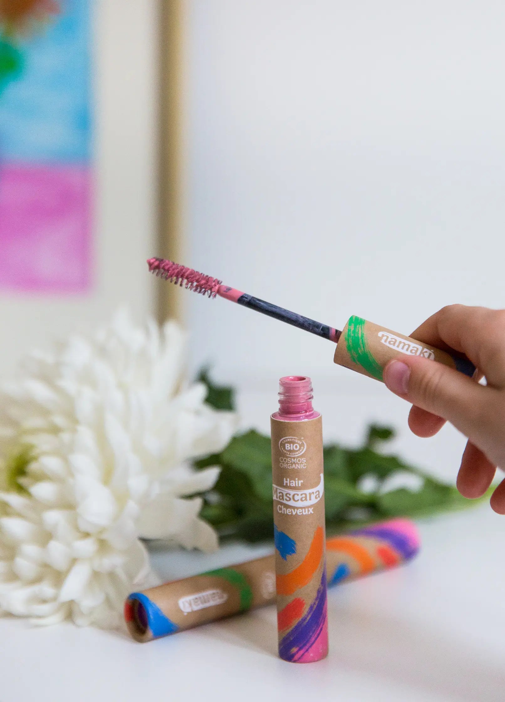 Embalagem expositora Yamann de máscaras capilares com produto modelador rosa
